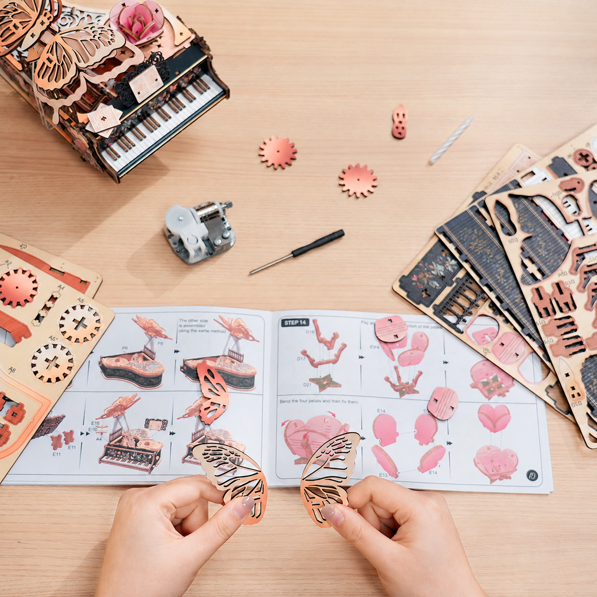 Floral Waltz kit laid out with the manual, music movement, screwdriver and wooden boards