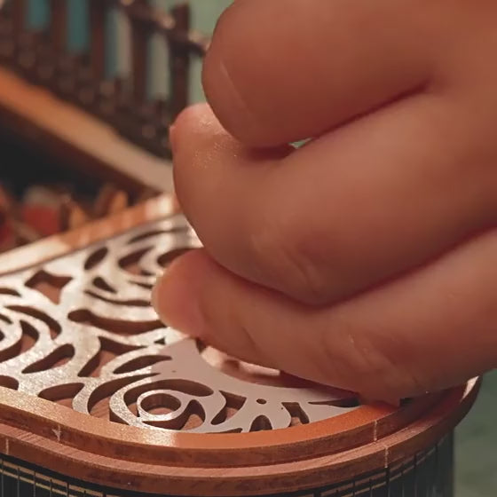 Turning the switch on the Floral Waltz lid