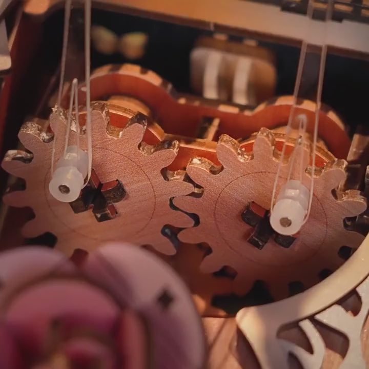 Gears inside Floral Waltz turning with clear acrylic rods